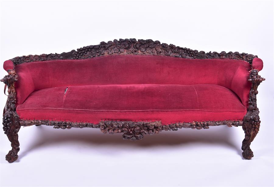 A 19th century European rosewood sofa the low back and frame with detailed carved fruit and - Image 13 of 26