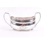 A George III Irish silver slop bowl of twin-handled oval form Dublin 1805, by William Doyle, with