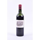 A bottle of Chateau Lafite Rothschild 1962 (low shoulder).