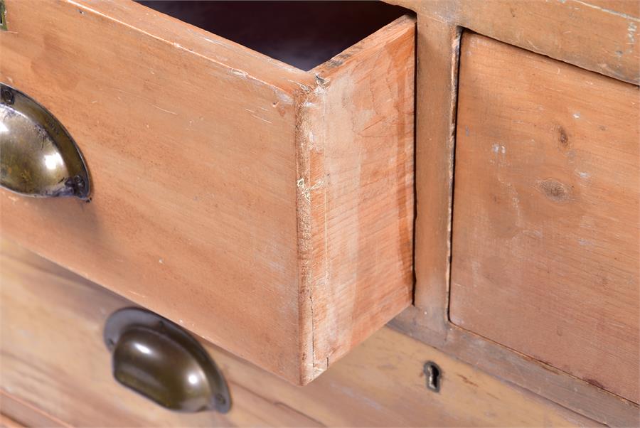 An early 20th century pine small chest with two short over two long drawers, the brass handles - Image 3 of 4