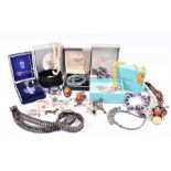 A quantity of costume jewellery to include a vintage bracelet and necklace set by Christian Dior,