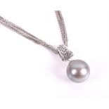 A 9ct white gold, diamond and grey pearl pendant set with a round grey pearl, 12 mm diameter, the