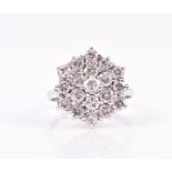 An 18ct white gold and diamond cluster ring of approximately 2.0 carats combined, size T 1/2, 7