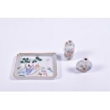 A Chinese Qing dynasty famille rose porcelain tray with polychrome enamels designed with an