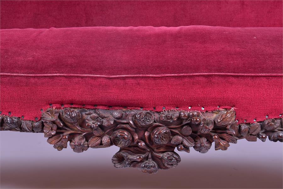 A 19th century European rosewood sofa the low back and frame with detailed carved fruit and - Image 3 of 26