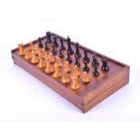 A ship’s Staunton chess set and inlaid mahogany, holly and rosewood chess/backgammon box, the