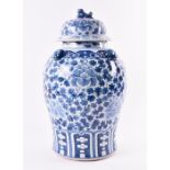 A large 19th century Chinese Temple vase the blue and white body with all round blossoming flower