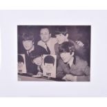 The Beatles: a set of signatures on a photograph with David Jacobs on Juke Box Jury, from Italian