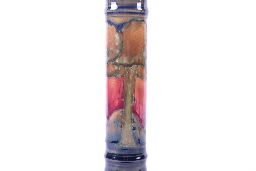 A pair of William Moorcroft pillar candlesticks in the Eventide pattern decorated with a band of - Image 4 of 4