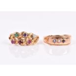 An 18ct yellow gold and gemstone 'Regard' ring the stylised rope-twist mount set with a ruby,