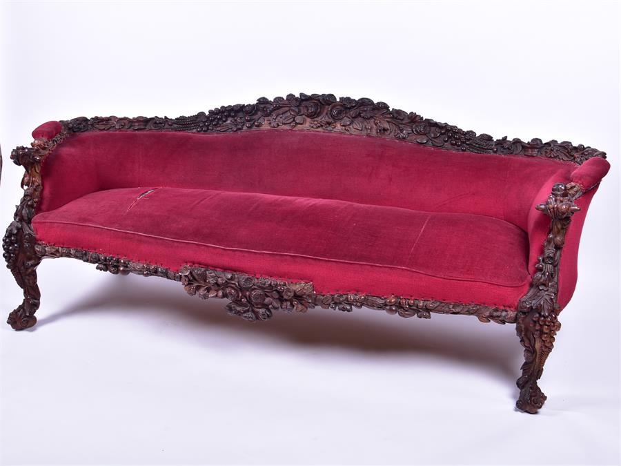 A 19th century European rosewood sofa the low back and frame with detailed carved fruit and - Image 2 of 26