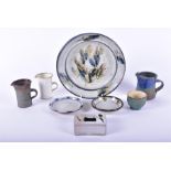 A collection of British studio pottery comprising a plate by Isabel K-J Denyer, a small dish by
