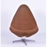 An Arne Jacobson style swivel egg chair upholstered with original cover, padded interior,