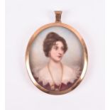 An 18th century portrait miniature on ivory depicting a young lady, her hair gathered on her head