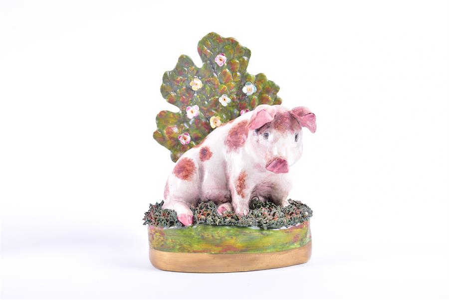A limited edition 'Staffordshire & Chelsea' bone china figurine of a seated pig in the 19th - Image 4 of 5