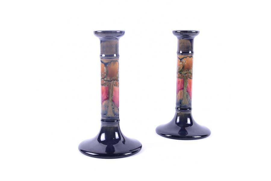 A pair of William Moorcroft pillar candlesticks in the Eventide pattern decorated with a band of - Image 3 of 4