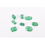 A small quantity of loose emeralds various sizes, approximately 6.50 carats combined.