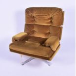 A mid-century swivel armchair by Howard Keith with button back and seat velour upholstery, on a
