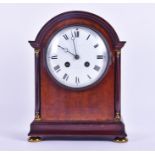 A mahogany cased mantel clock with dome top the striking eight day movement signed 'Medaille d'or