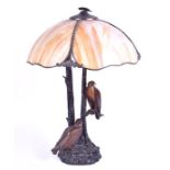 An impressive early 20th century Continental bronze desk lamp with mottled glass shade in the