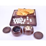 A Chinese glass chess set for xiangqi the discs inscribed with the names of the pieces in Chinese,