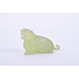 A Chinese carved celadon jade study of a crouching lion 8 cm wide x 5.5 cm high.