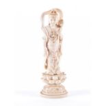 A late 19th / early 20th century Chinese carved ivory Guanyin figure the figure standing on a