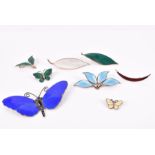 A Scandinavian silver and enamel butterfly brooch decorated in blue enamel (some losses), 8 cm wide,