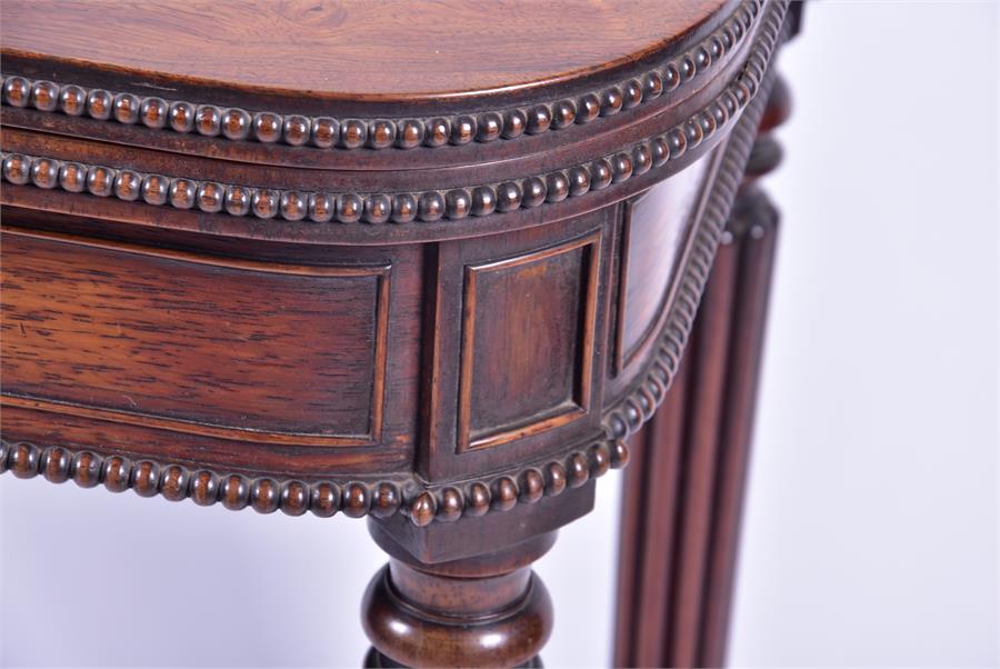 A Victorian rosewood fold-over card table with beaded borders in the Regency manner, opening to - Image 3 of 4