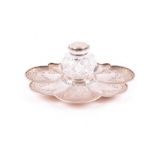 A Victorian silver and cut glass inkstand London 1862, by John Wilmin Figg, of lobed petal form with