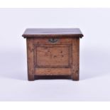 A late 17th century and later oak child's coffer with brass side handles and escutcheon, 52 cm x