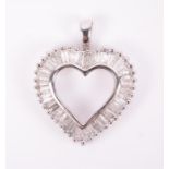 A 14ct white gold and diamond heart-shaped pendant of openwork form, calibre-set with baguette-cut
