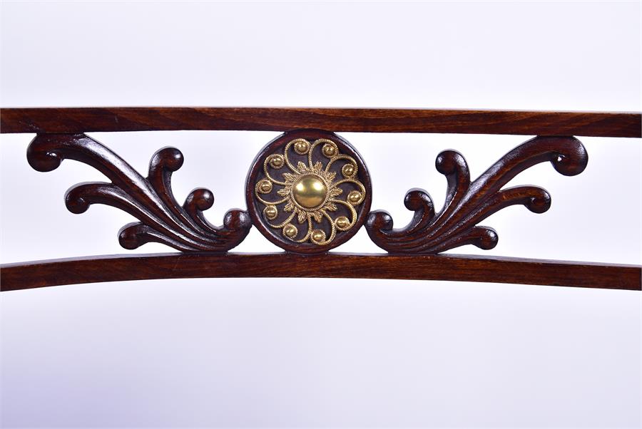 A pair of Regency style stained oak armchairs each with caned seats, applied brass collars and - Image 3 of 4