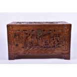 A Chinese hardwood camphor chest intricately carved throughout, with brass lock plate, 104 cm x 51