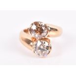 An impressive 18ct yellow gold and diamond ring set with an old-cut cognac diamond and an old-cut