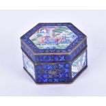 A 19th century Chinese enamelled lidded box of hexagonal form, painted with vignettes of a group