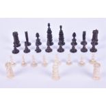 An ivory and ebony part chess set, late 17th century or early 18th century the black side