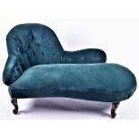 A Victorian button back chaise longue with dark green velvet upholstery, on mahogany front scroll