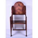 An Edwardian Arts & Crafts mahogany inlaid chair the back inlaid with flower heads, with solid
