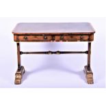 A Regency two-drawer walnut veneered library table  of rectangular form, with a gilt-tooled scriber,