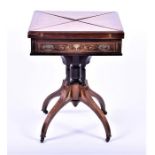 A fine Edwardian inlaid rosewood envelope card table the rotating top inlaid with satinwood