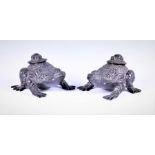 A pair of South Asian bronze vessels in the form of seated toads of stylised proportions, with