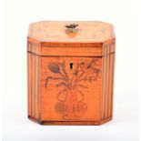 A George III satinwood tea caddy with inlaid floral decoration and reeded canted corners. 11.5 cm
