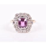 An 18ct yellow gold, diamond, and pink sapphire ring set with a faceted emerald-cut stone,