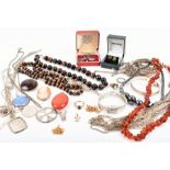 A group of silver and costume jewellery items to include various silver bracelets, a multi-