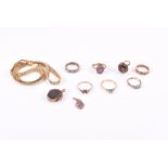 A group of yellow metal jewellery including two 9ct gold rings, a rose metal bloodstone seal, a