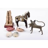 A small collection of antiquity related artworks comprising a Persian bronze model of a jackal or