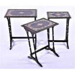 A nest of three simulated rosewood occasional tables with painted decoration, late 19th century, the