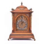 A Victorian brass mounted and oak cased bracket clock with movement by ‘Winterhalder & Hoffmeier’,