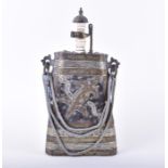 A wooden and metal mounted Moroccan powder flask of narrow triangular form, relief decorated, 35